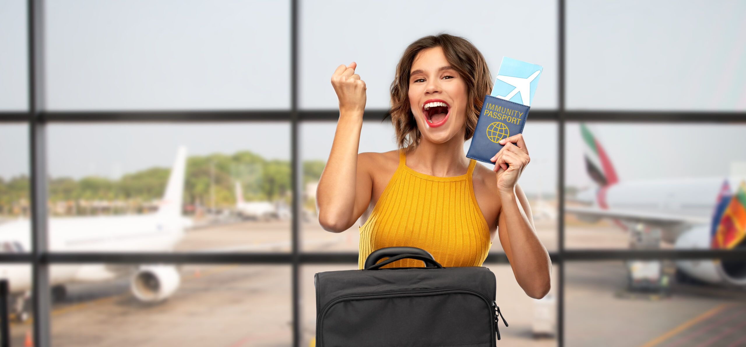 happy woman with air ticket immunity passport scaled